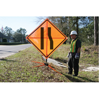 Tilt-Adjust Merge Left Roll-Up Construction Sign, 36" x 36", Vinyl, Pictogram Nuna Depot Inc.